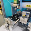 Cabinet-style dual-head (front and rear) screw-driving machine; custom-made fixture with flipping mechanism for fastening; suitable for plastic products; Chinese manufacturer.